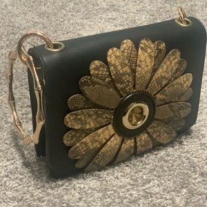 Black bangle purse with snake print flower
